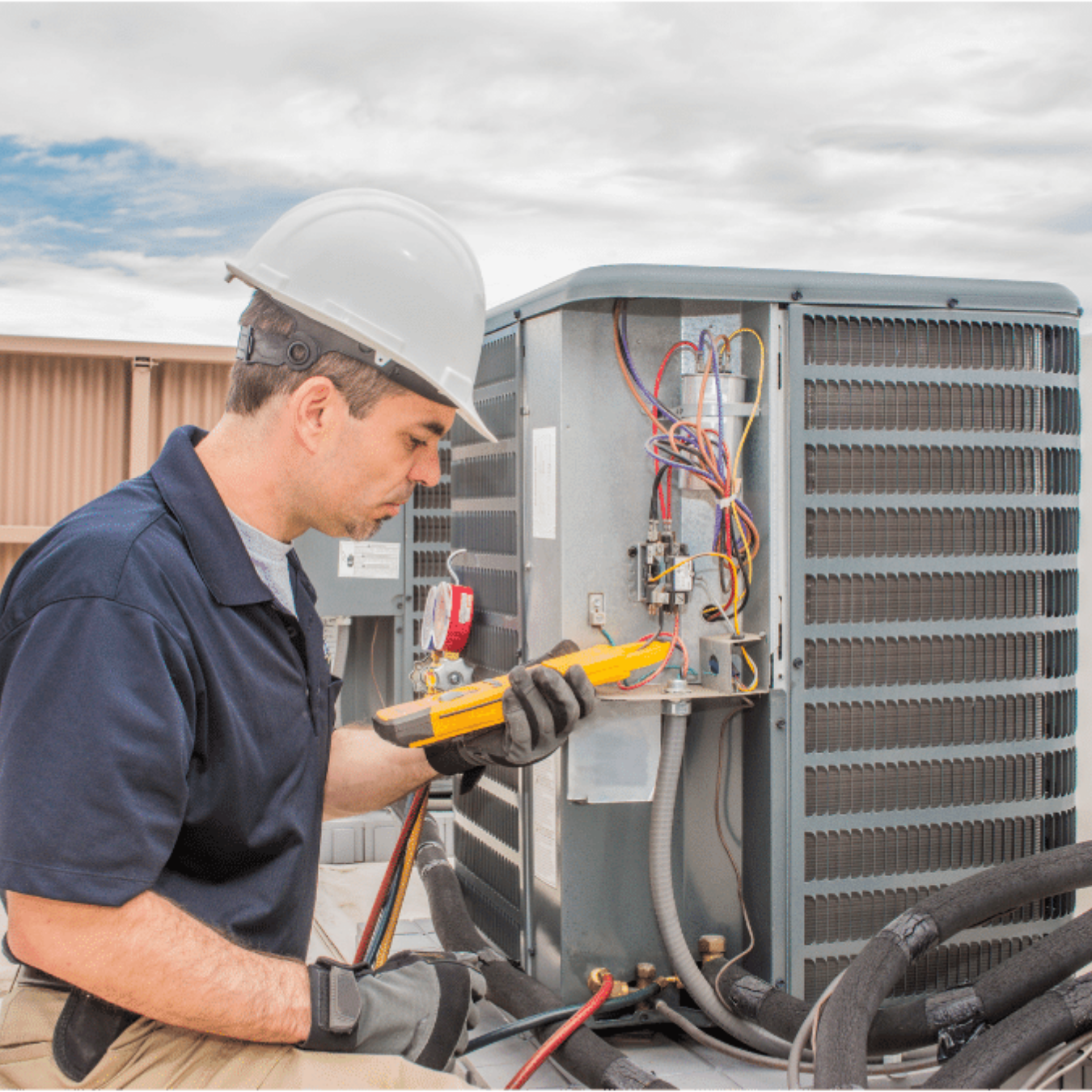 Licensed HVAC technician servicing a heating system